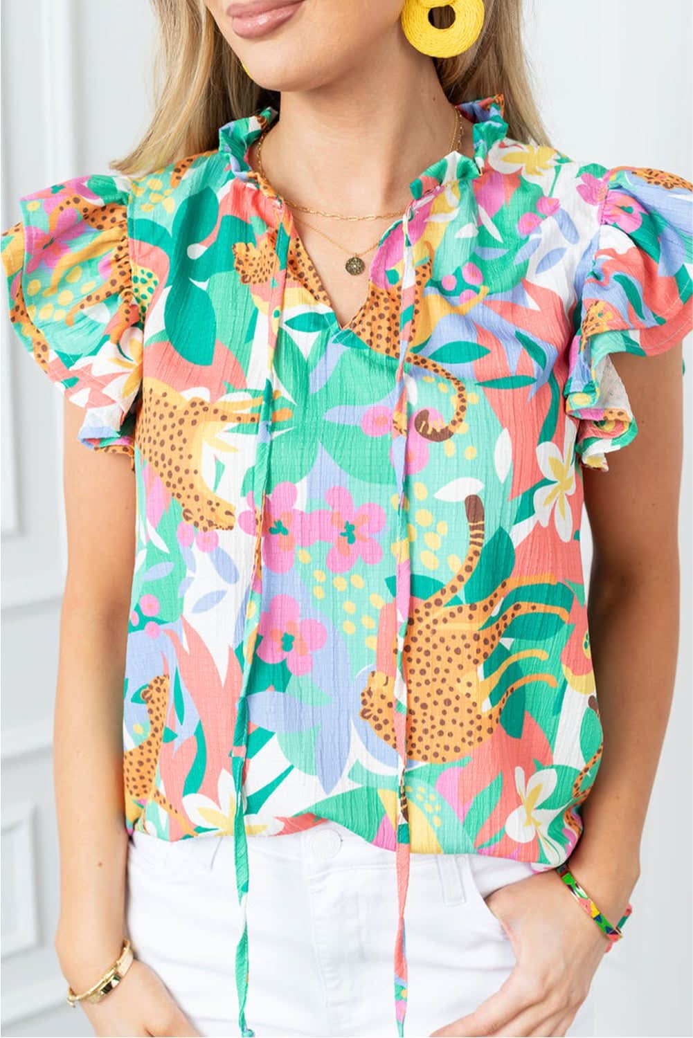 Floral green tie-neck blouse