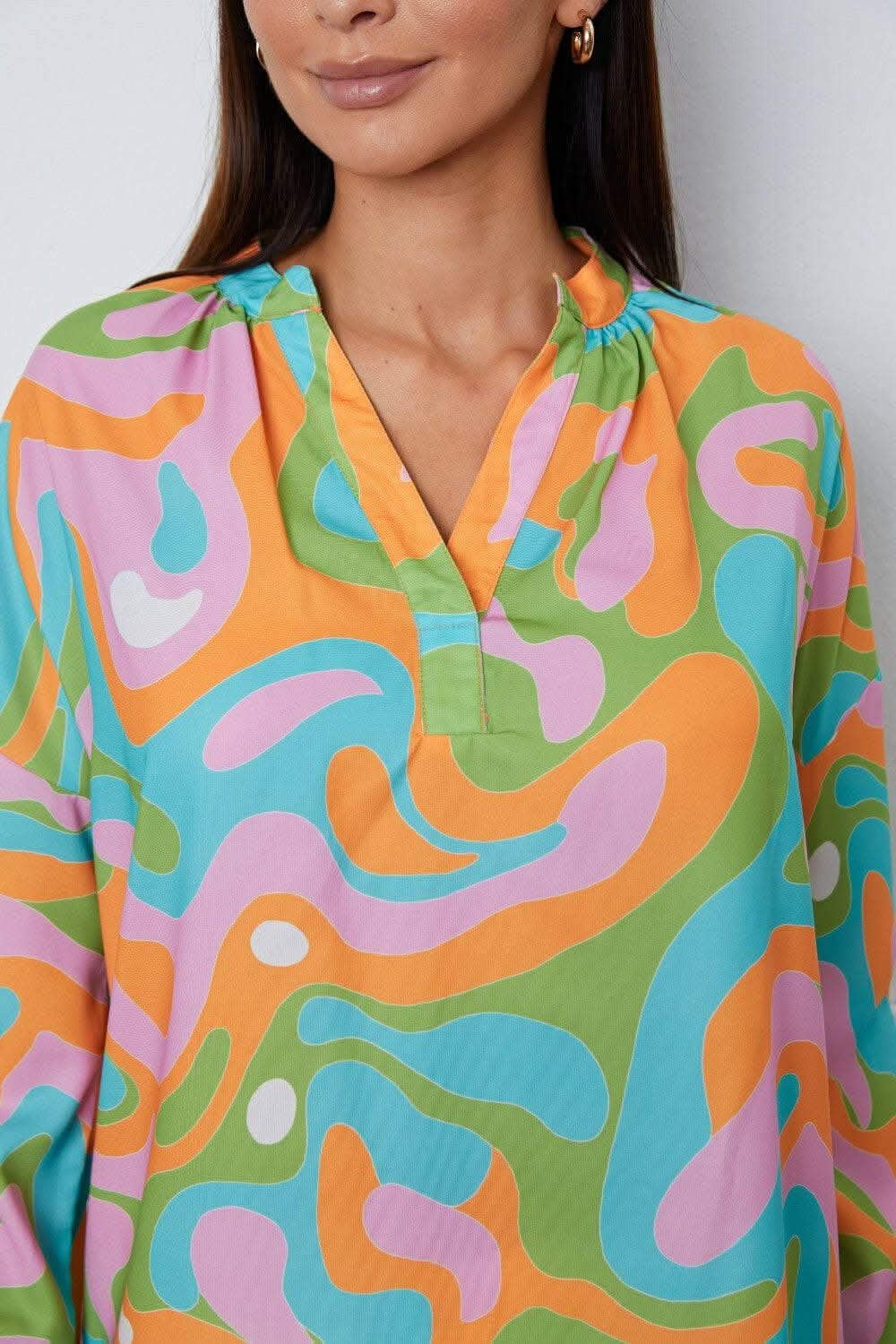 Chic notched blouse in prints