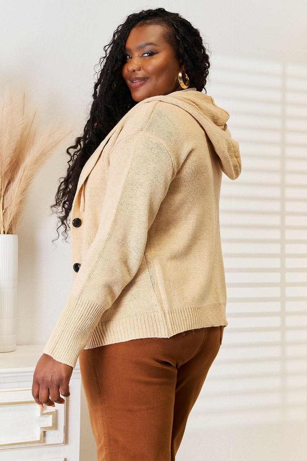 Cozy hooded sweater with buttons