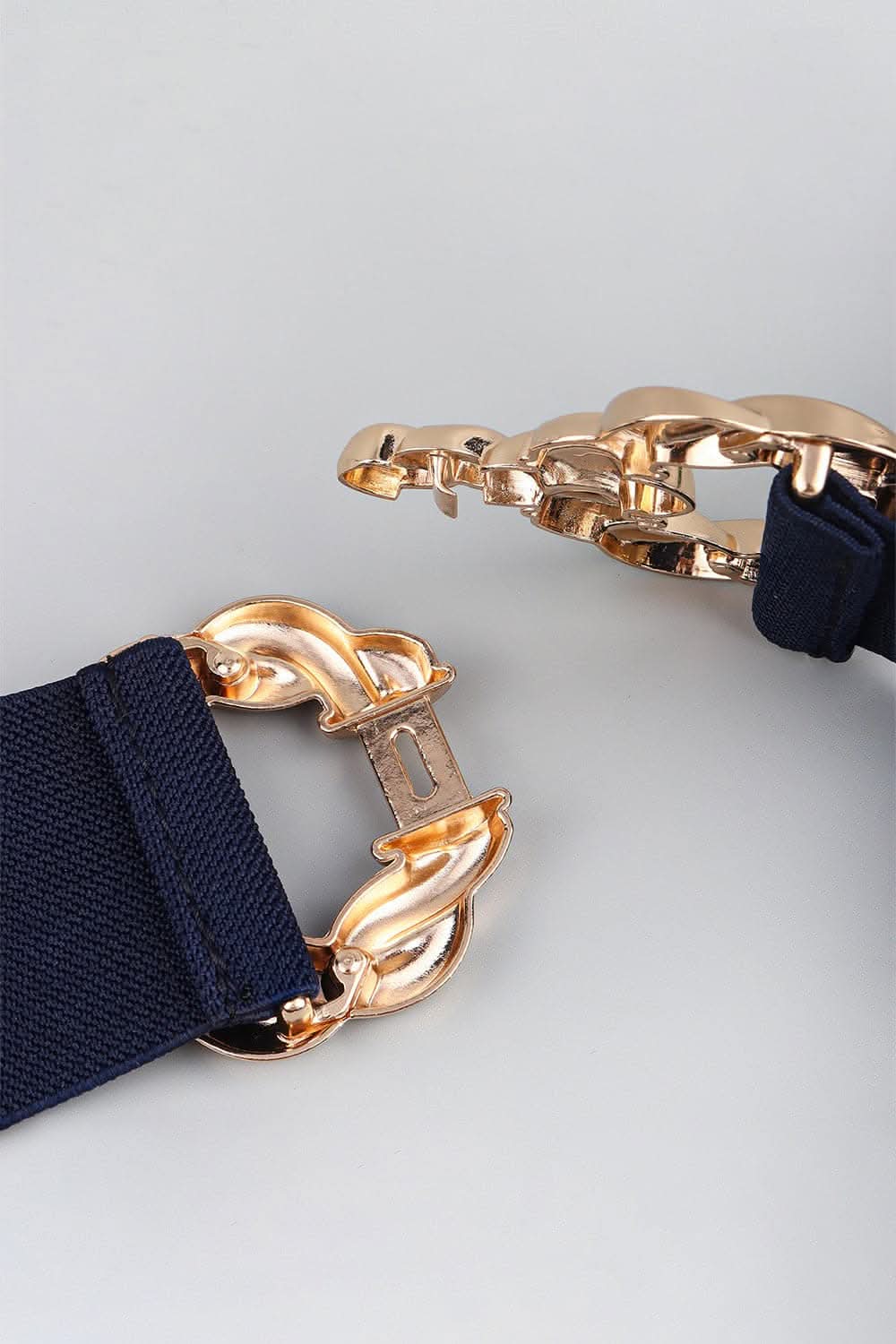 Elastic belt with zinc alloy buckle