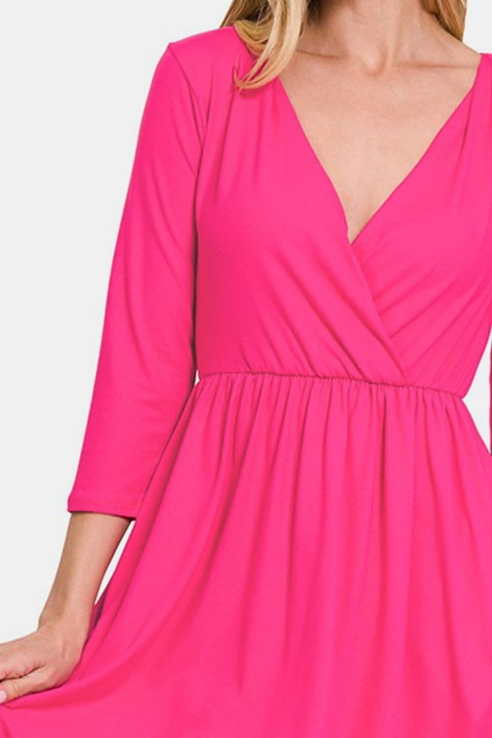 Elegant Surplice Dress with Pockets and Three-Quarter Sleeves