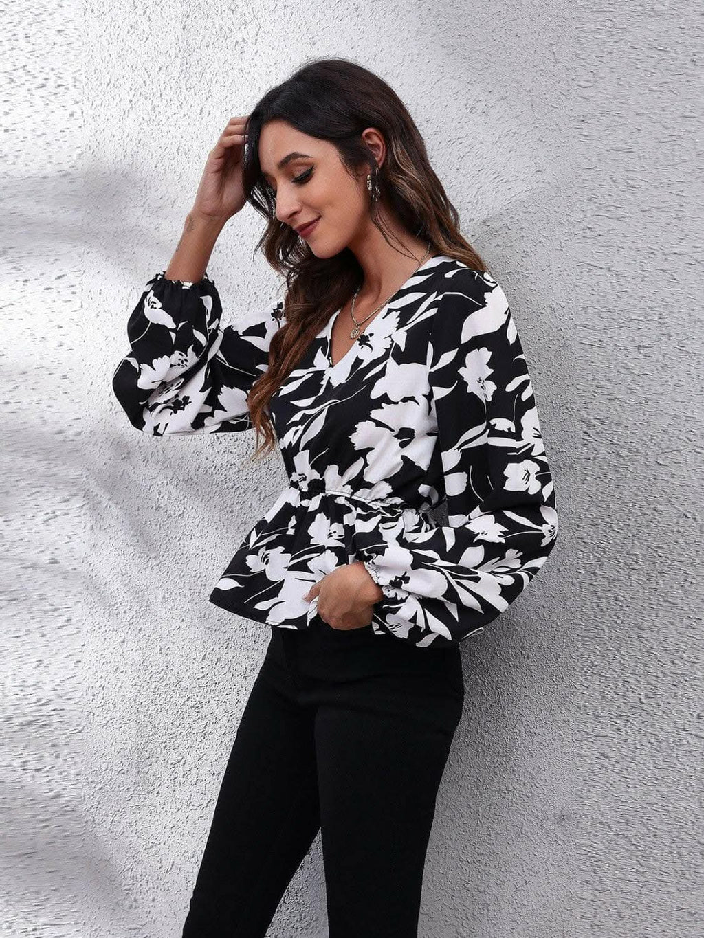 Floral peplum blouse with v-neck