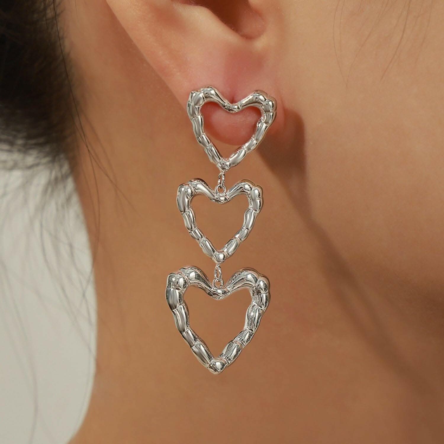 Heart-shaped titanium earrings
