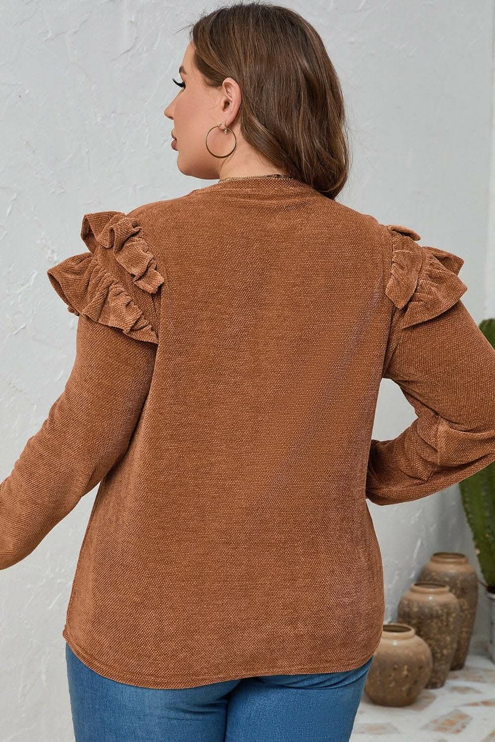 Plus size ruffled blouse in black