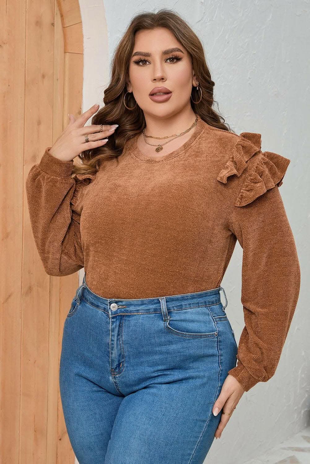 Plus size ruffled blouse in black