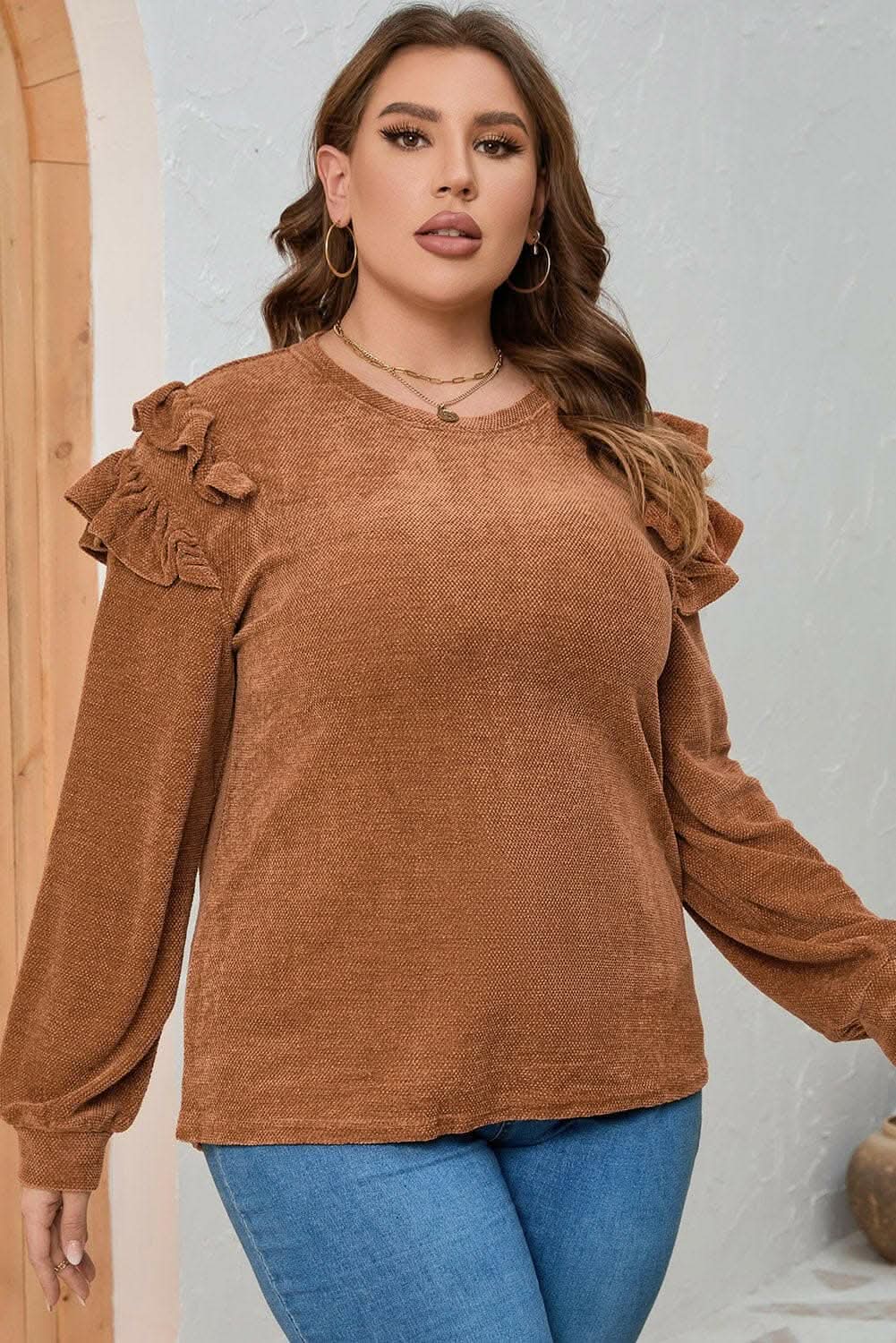 Plus size ruffled blouse in black