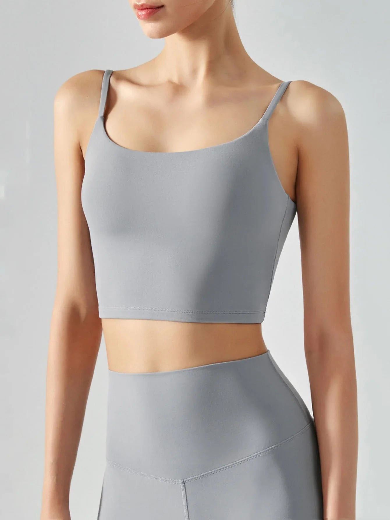 Women's sports bra with chest cushion, vest and suspender