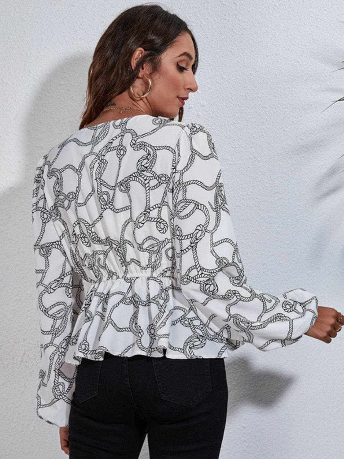 V-neck peplum blouse with sleeves