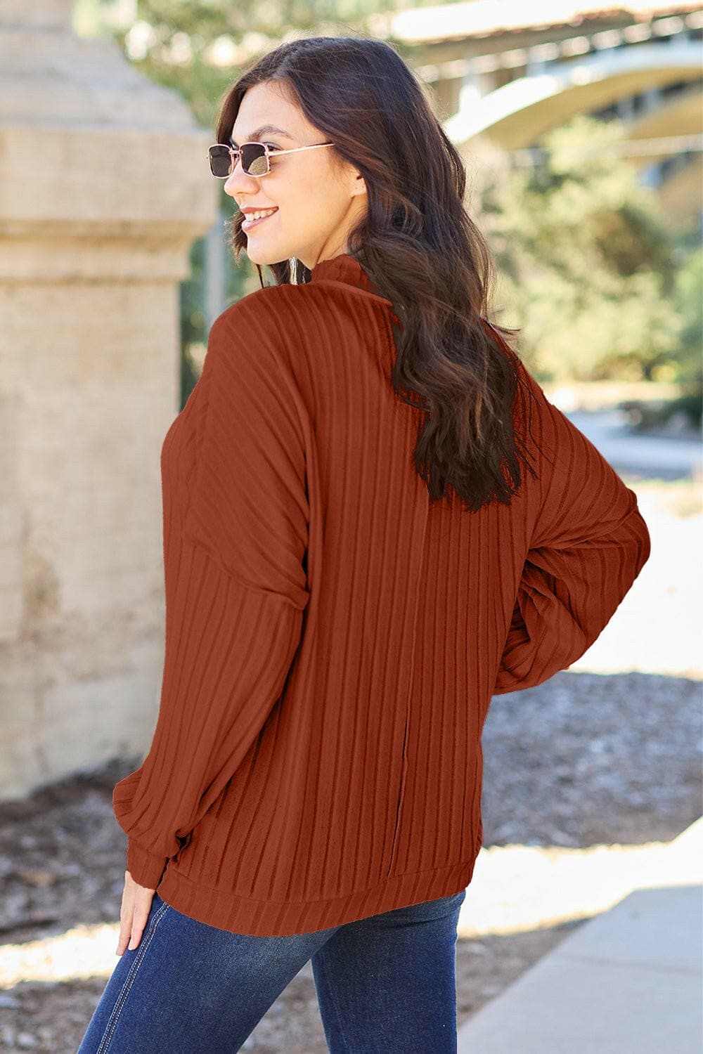 Chic ribbed mock neck top – exposed seams