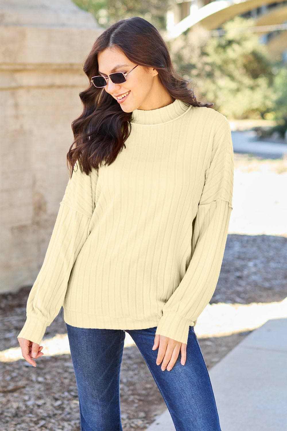 Chic ribbed mock neck top – exposed seams