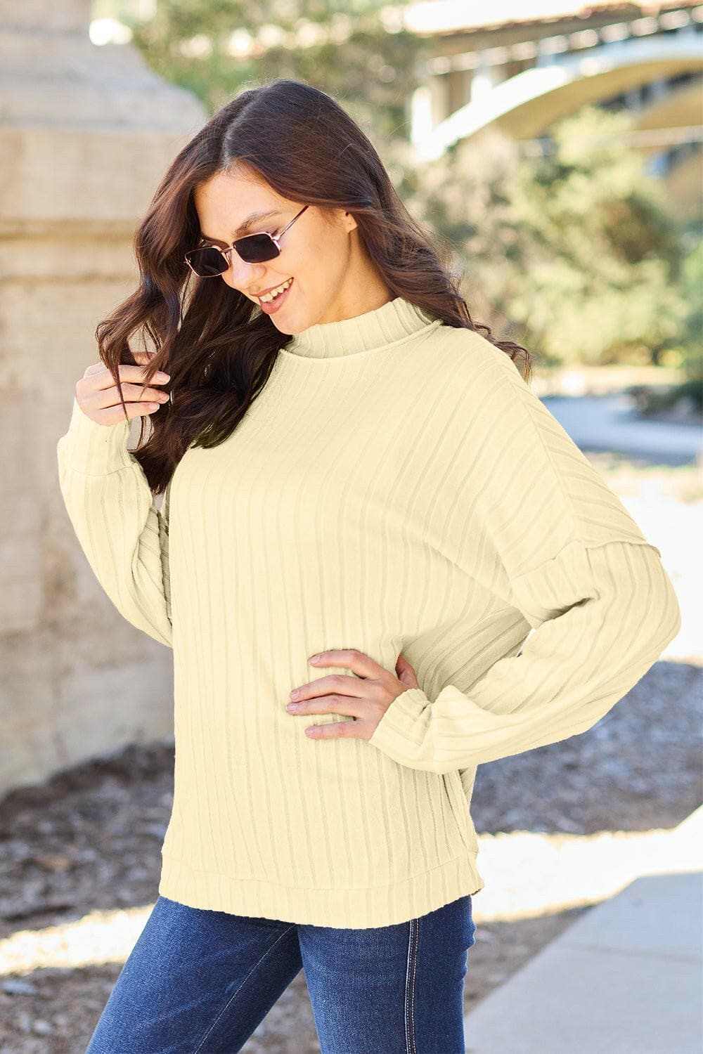 Chic ribbed mock neck top – exposed seams