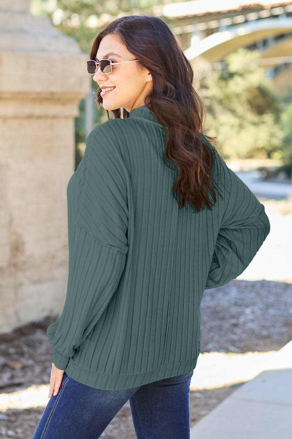 Chic ribbed mock neck top – exposed seams