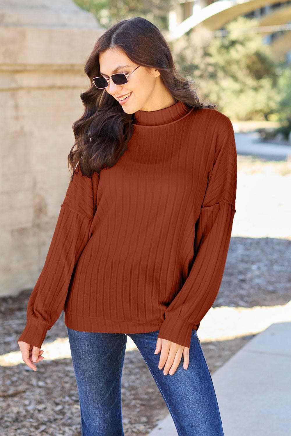 Chic ribbed mock neck top – exposed seams