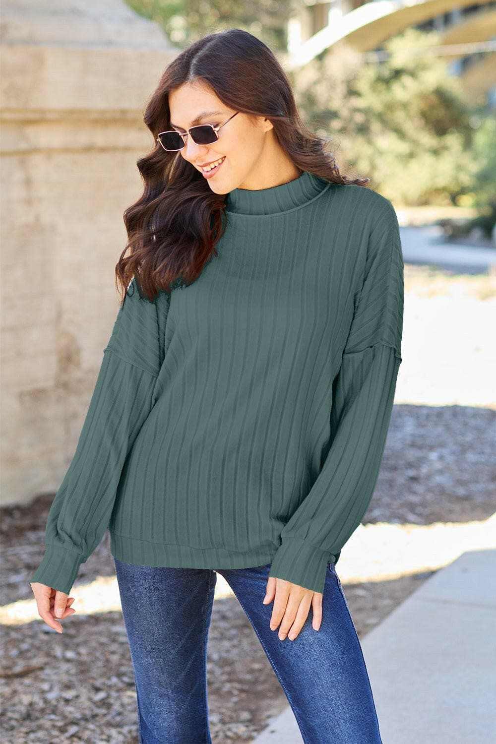 Chic ribbed mock neck top – exposed seams