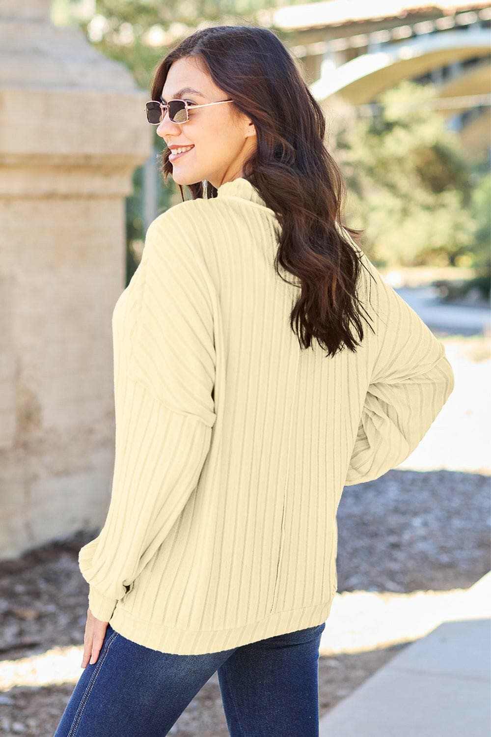 Chic ribbed mock neck top – exposed seams