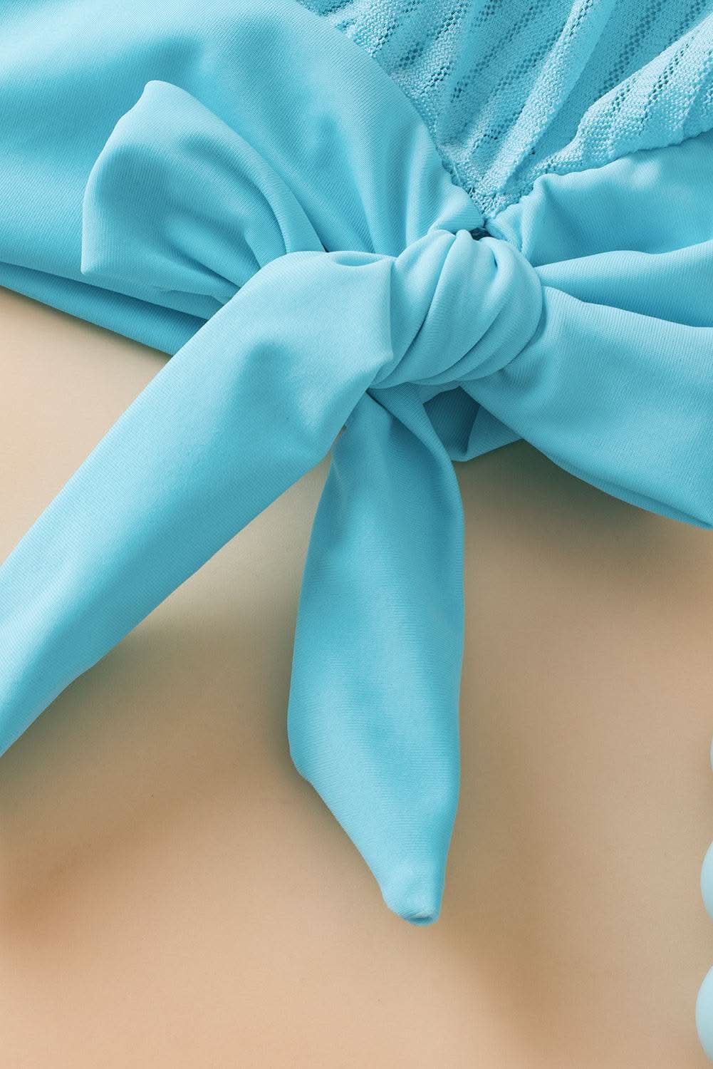 Turquoise mesh tankini with knot detail