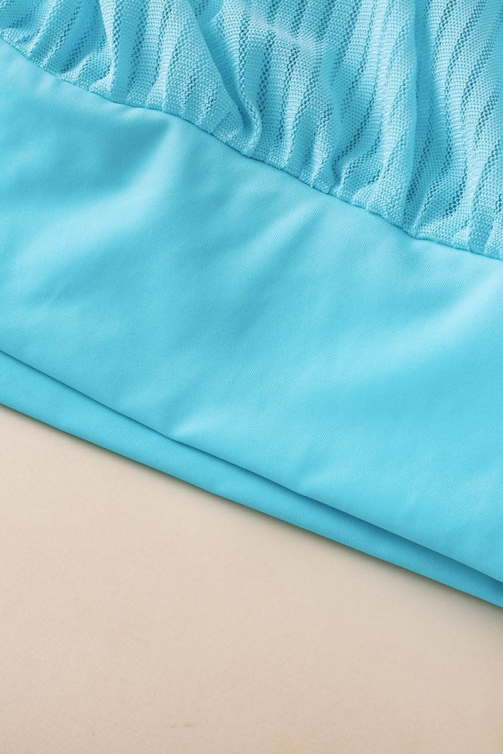 Turquoise mesh tankini with knot detail